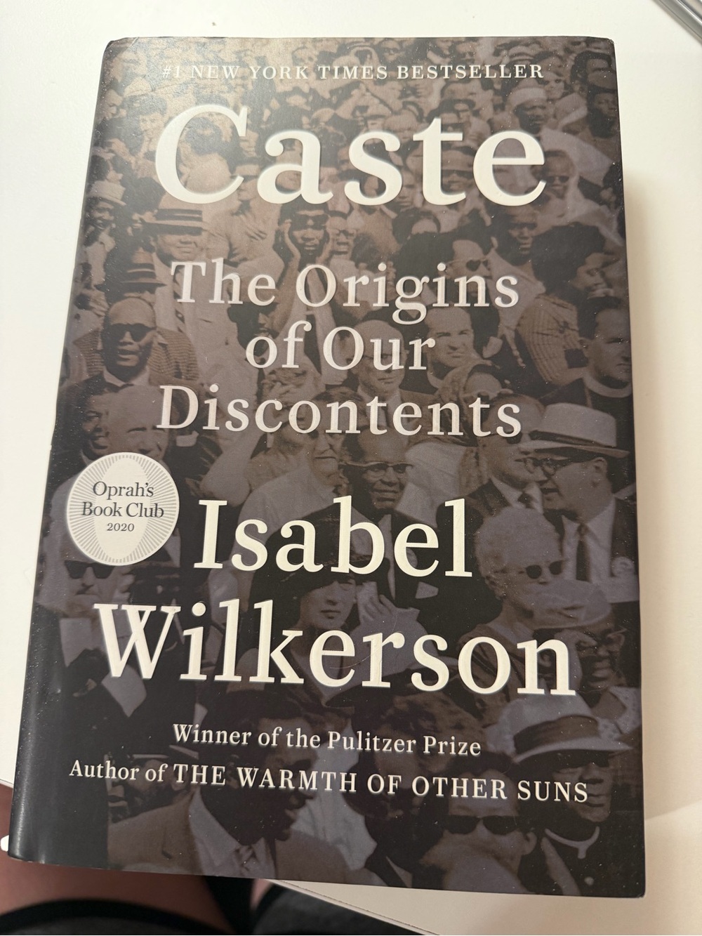 Source Unknown Caste book cover in sepia and cream
